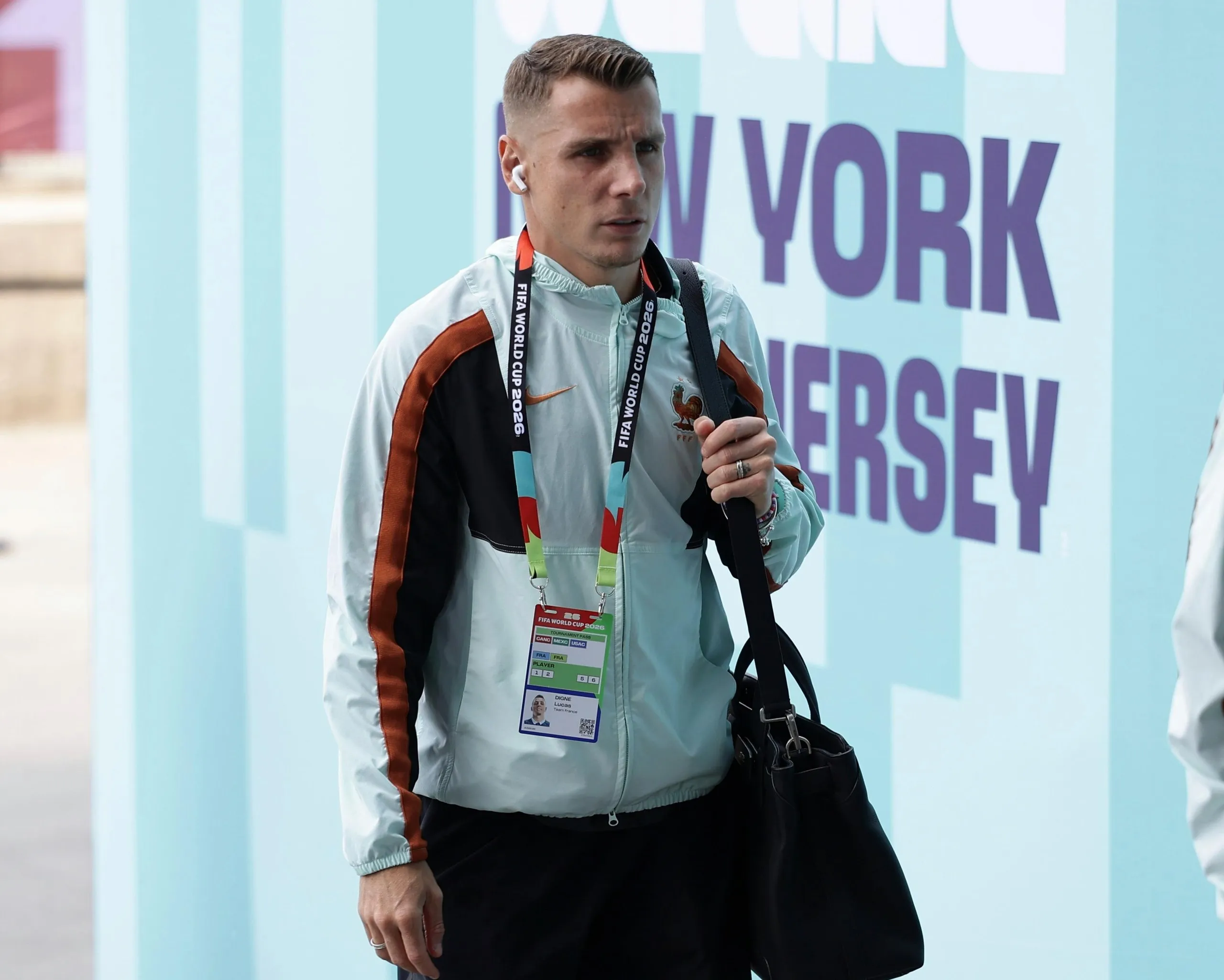 Lucas Digne wanders into the stadium.