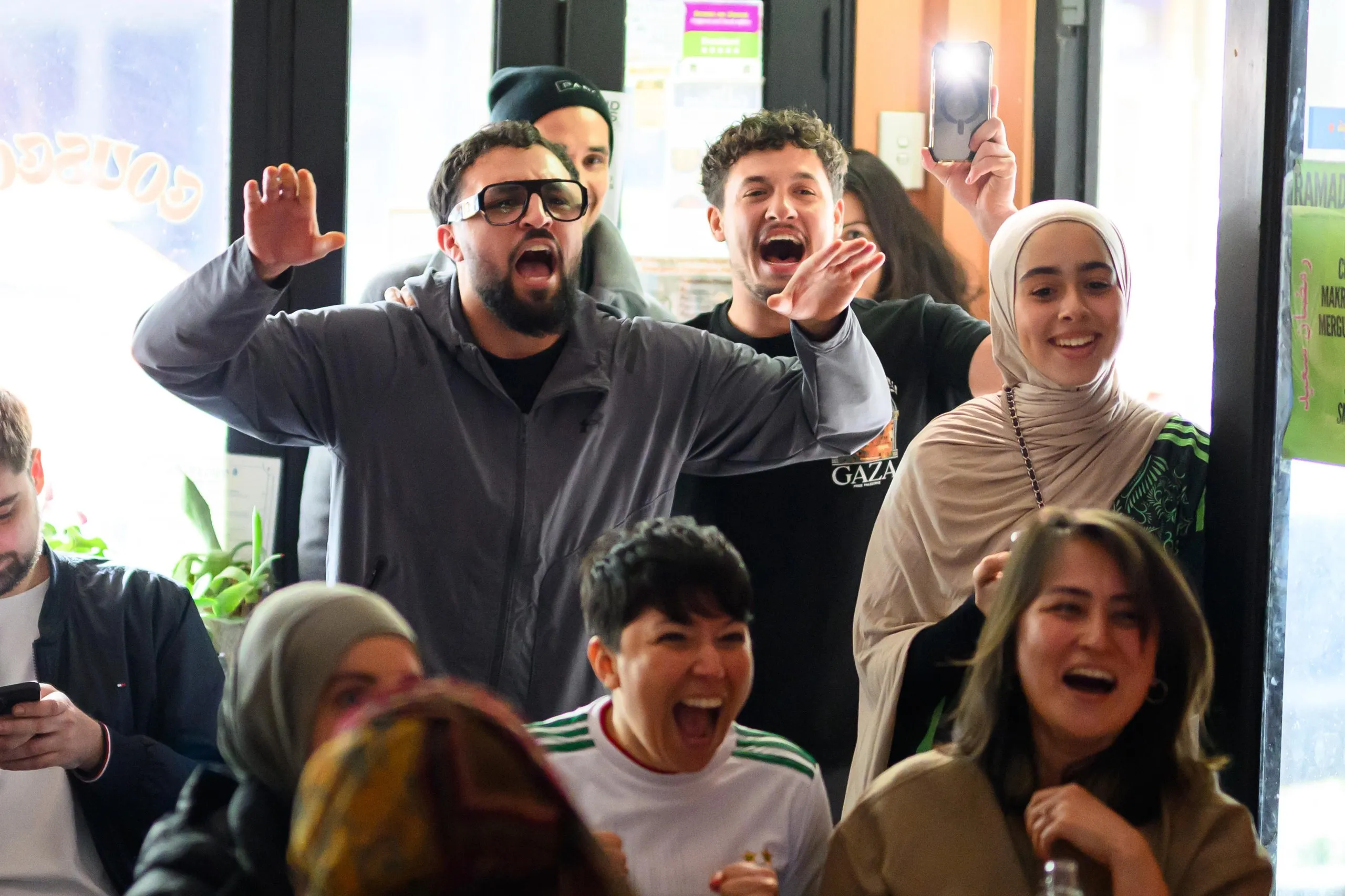 Excited fans during the tense match.