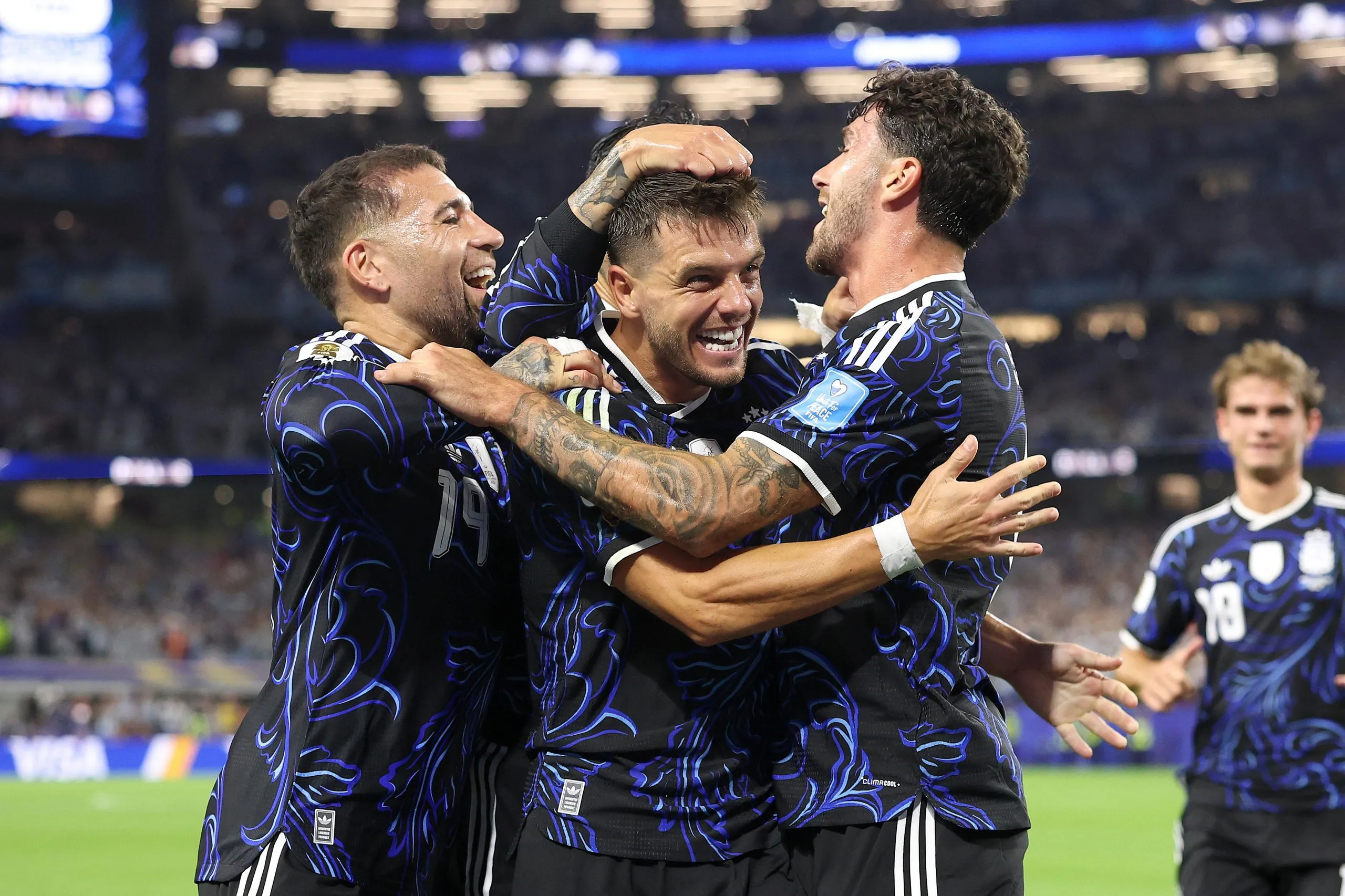 Giovani Lo Celso of Argentina celebrates with teammates after scoring his team's first goal