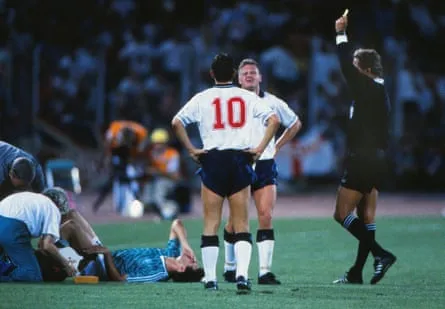 Paul Gascoigne is booked for fouling Thomas Berthold in the Stadio delle Alpi.