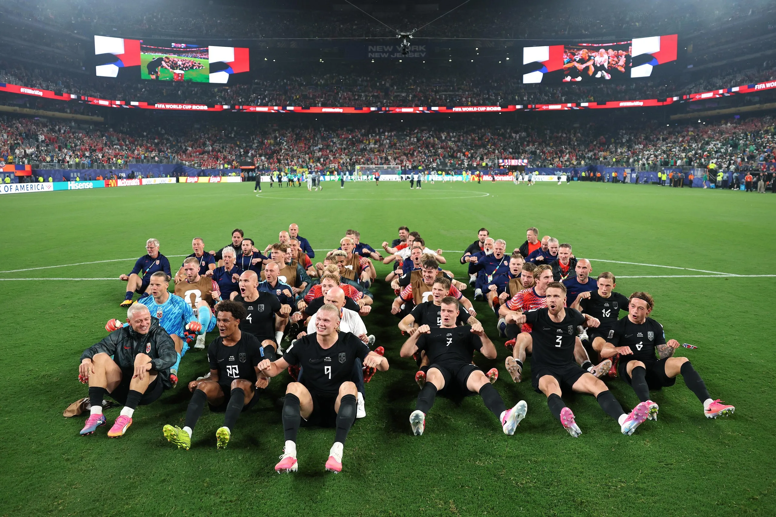 Erling Haaland and his Norway teammates join their fans in their trademark rowing celebration post-match