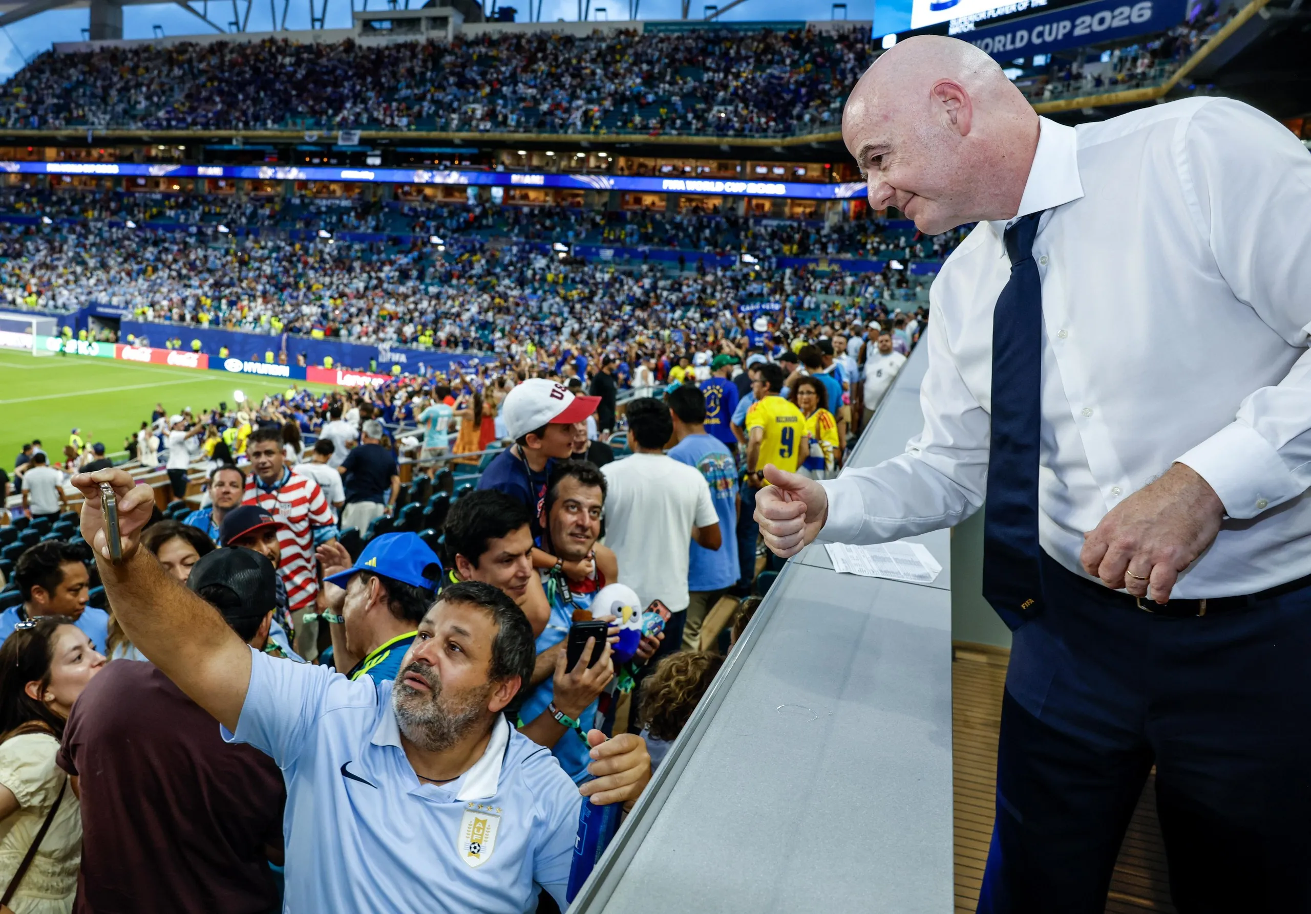 The Fifa president, Gianni Infantino, interacts with fans during the World Cup match between Uruguay and Cape Verde.