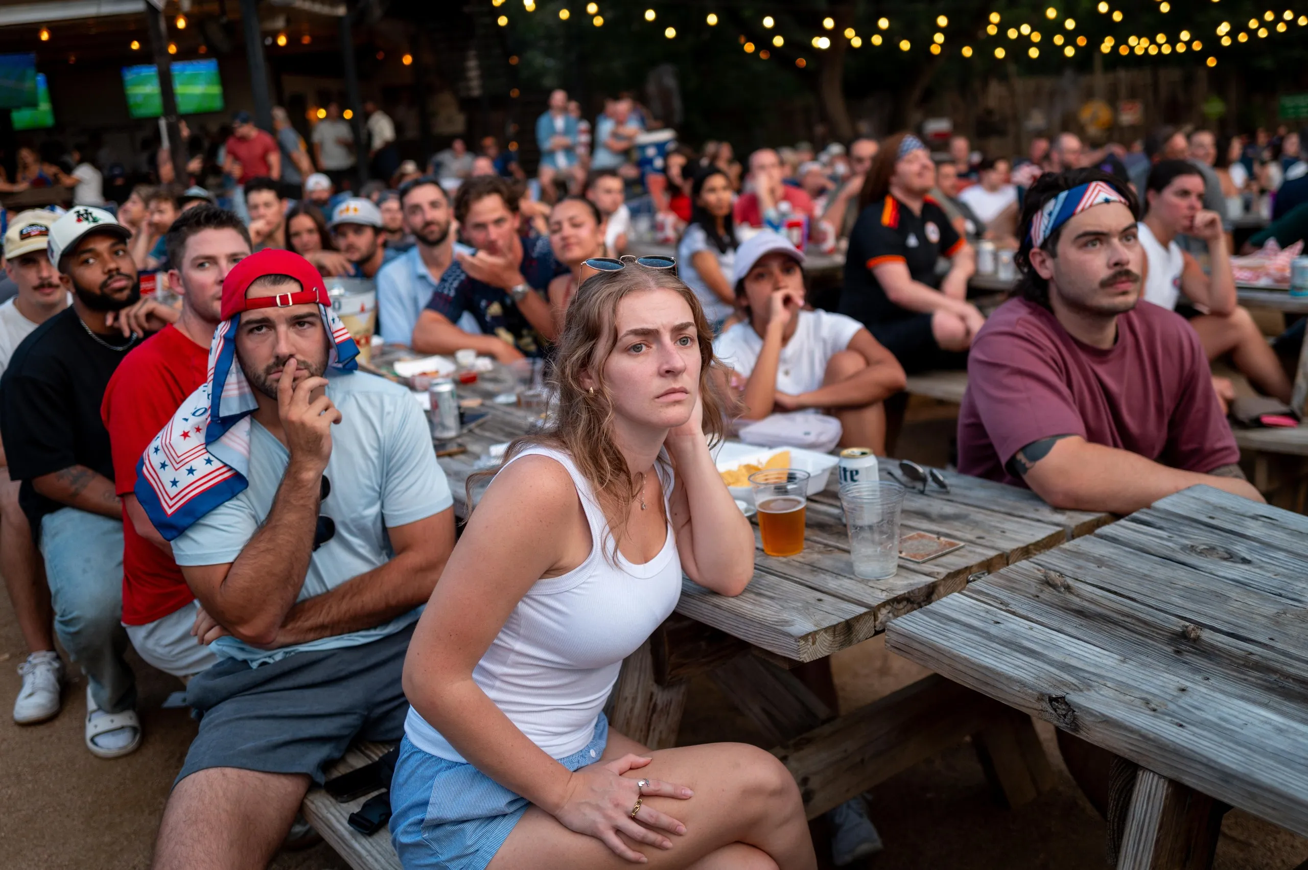 people watching a television